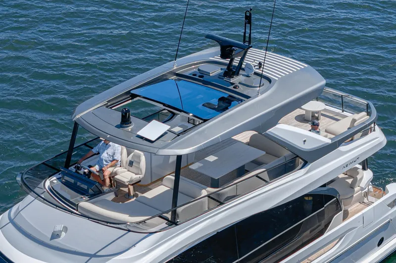 Slide: The Image of Luxury Azimut Fly 72 yacht cruising on the water, 2026 model. - 22