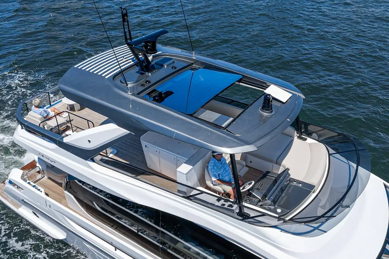Slide: The Image of Luxurious 2026 Azimut Fly 72 yacht cruising on open water, featuring spacious flybridge. - 24