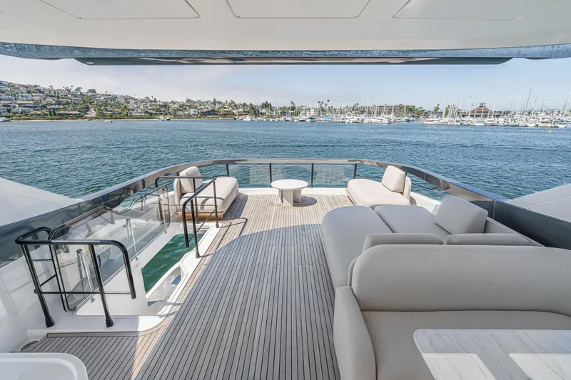 Slide: The Image of Luxurious 2026 Azimut Fly 72 yacht deck with elegant seating and scenic ocean view. - 28