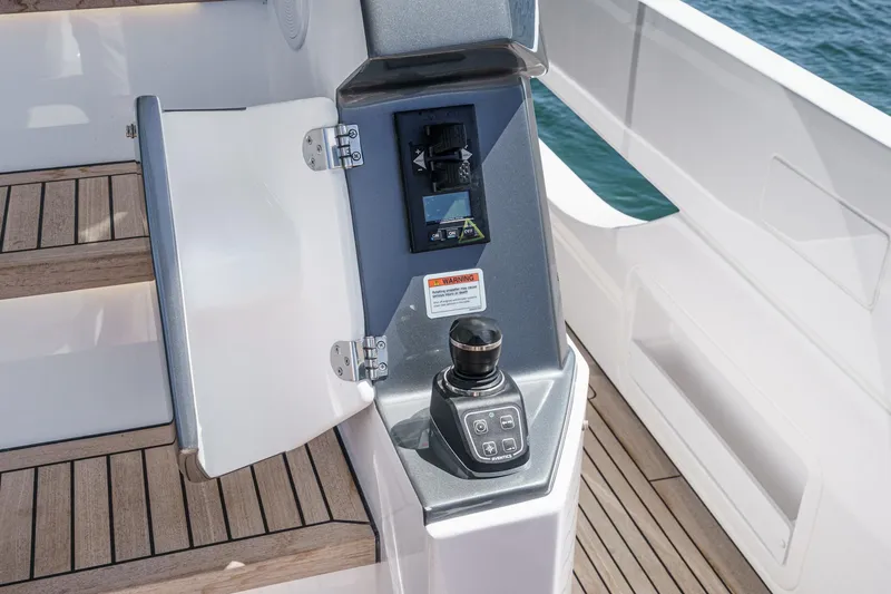 Slide: The Image of Control panel on 2026 Azimut Fly 72 yacht, featuring joystick and display. - 36