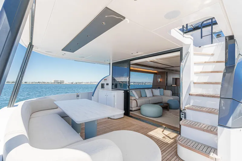 Slide: The Image of Luxurious 2026 Azimut Fly 72 yacht interior with elegant seating and ocean view. - 38