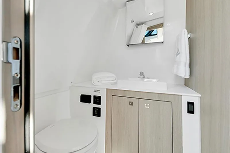 Slide: The Image of Luxurious bathroom in 2026 Cruisers Yachts 38 VTR, featuring modern fixtures and elegant design. - 10