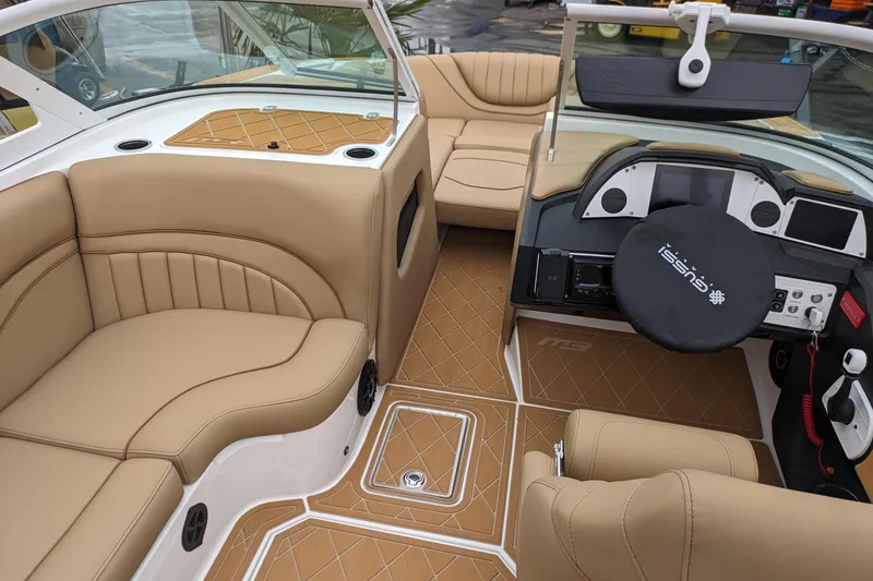 Slide: The Image of Luxurious interior of 2026 MB F22 Tomcat Alpha boat with tan leather seating. - 10
