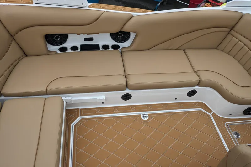 Slide: The Image of Luxurious tan seating in 2026 MB F22 Tomcat Alpha boat interior. - 11