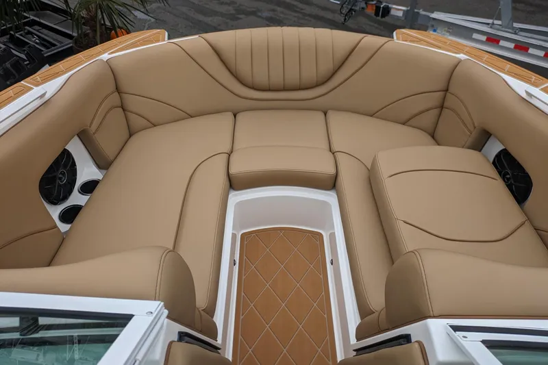 Slide: The Image of Luxurious tan seating in 2026 MB F22 Tomcat Alpha boat interior. - 6