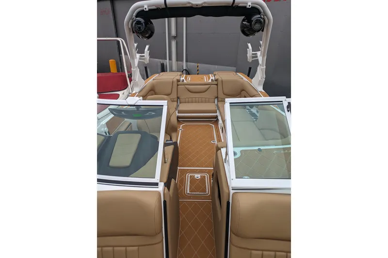 Slide: The Image of 2026 MB F22 Tomcat Alpha boat interior with tan leather seats and modern design. - 7