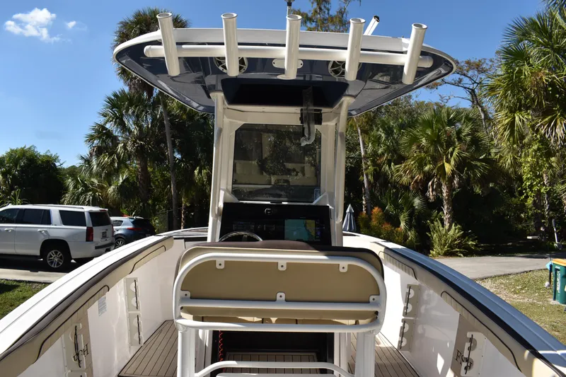 Slide: The Image of Open storage compartment on 2023 Yamaha Boats 252 FSH Sport, showcasing interior features. - 10