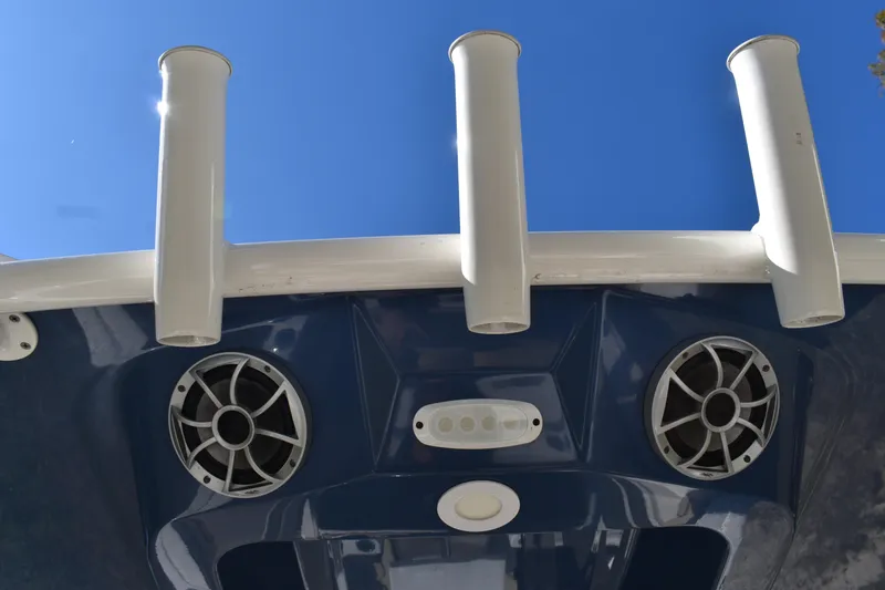 Slide: The Image of 2023 Yamaha Boats 252 FSH Sport interior view at a boat dealership. - 11