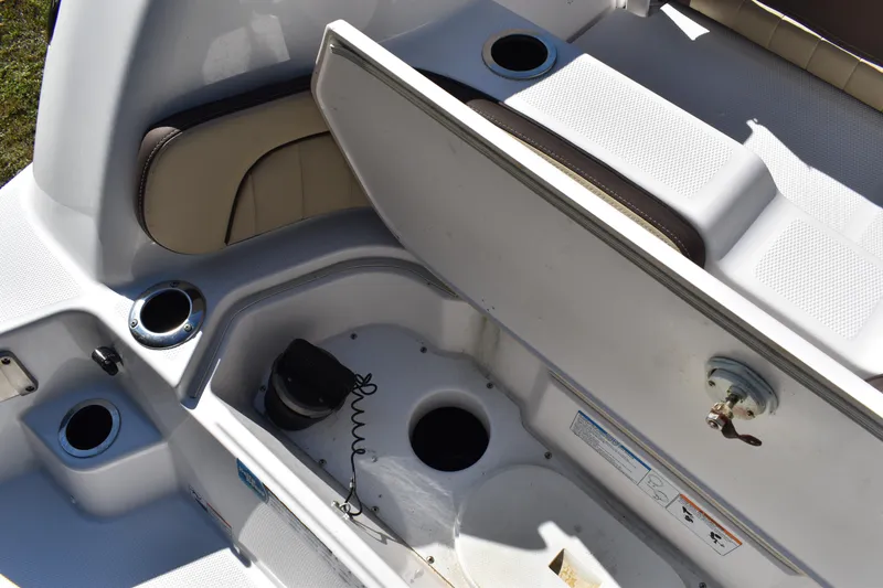 Slide: The Image of 2023 Yamaha Boats 252 FSH Sport interior with dual seats and steering wheel. - 40