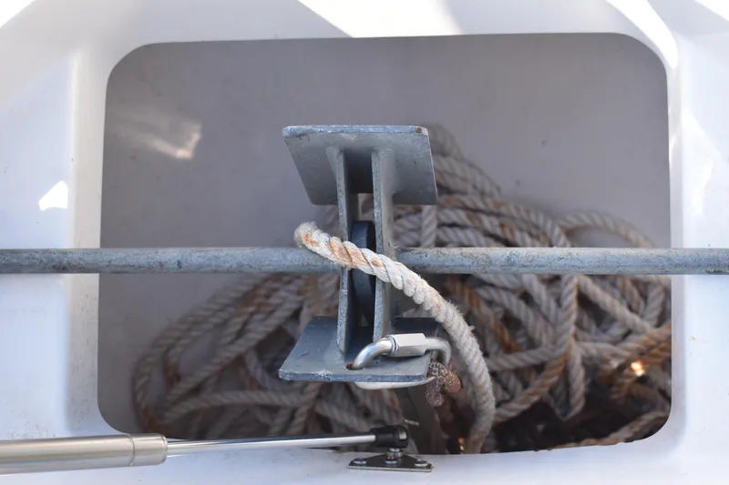 Slide: The Image of 2023 Yamaha Boats 252 FSH Sport engine compartment with open hatch, showcasing dual engines. - 46