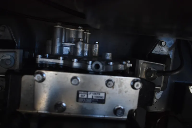 Slide: The Image of Close-up of Yamaha 252 FSH Sport 2023 engine component with serial number. - 55