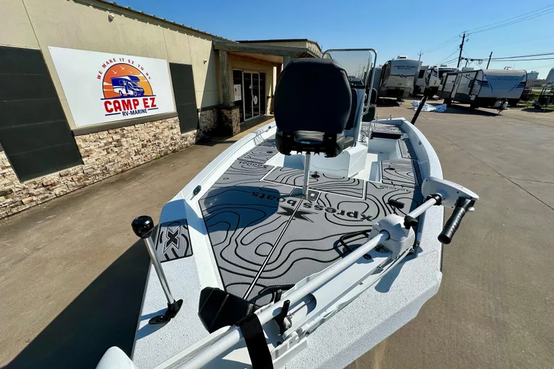 Slide: The Image of 2026 Express H20B boat at Camp EZ RV-Marine dealership, showcasing modern design and features. - 10