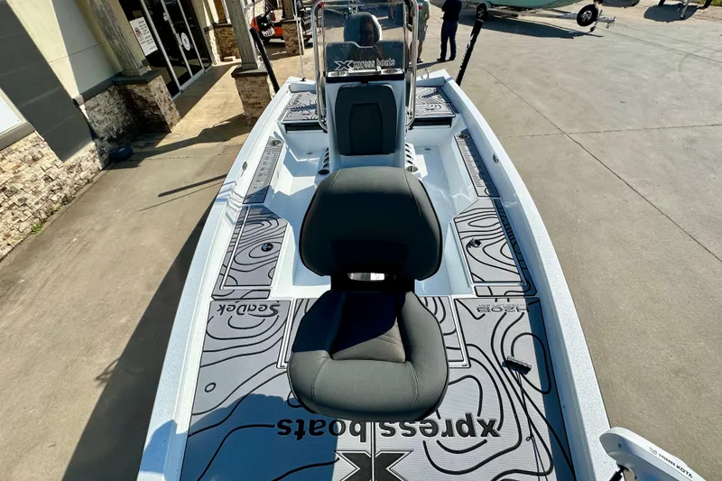 Slide: The Image of 2026 Express H20B boat with stylish seating and modern design on display. - 12