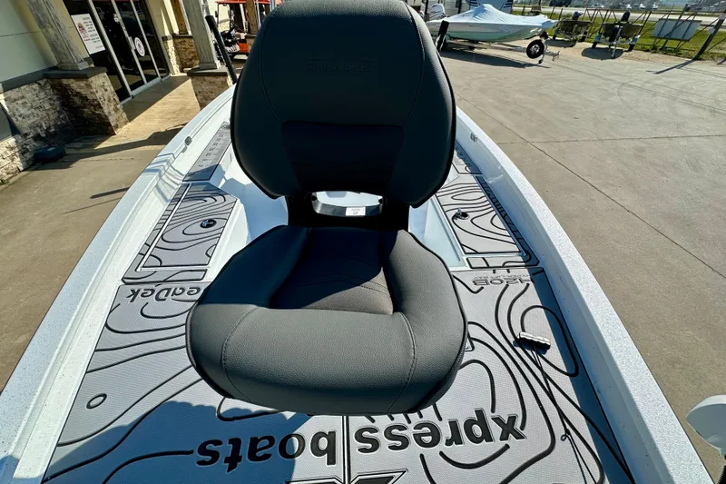 Slide: The Image of 2026 Express H20B boat with cushioned seat and stylish deck design. - 13