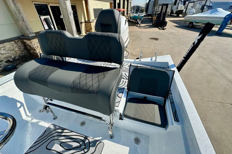 Slide: The Image of 2026 Express H20B boat interior with cushioned seating and modern design. - 18