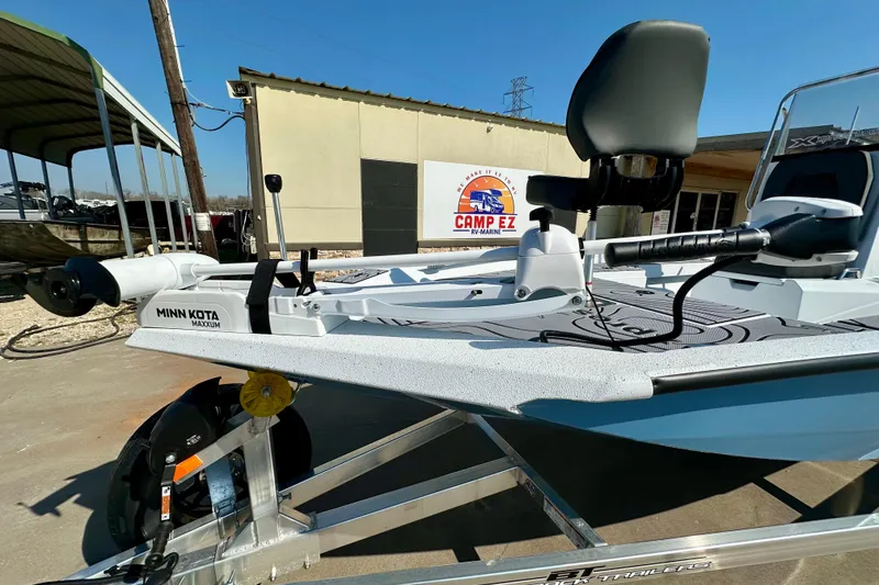 Slide: The Image of 2026 Express H20B boat with Minn Kota Maxxum motor at Camp EZ RV-Marine. - 20