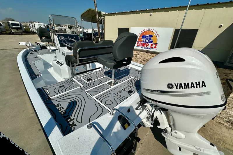 Slide: The Image of 2026 Express H20B boat with Yamaha motor at Camp EZ RV-Marine dealership. - 9