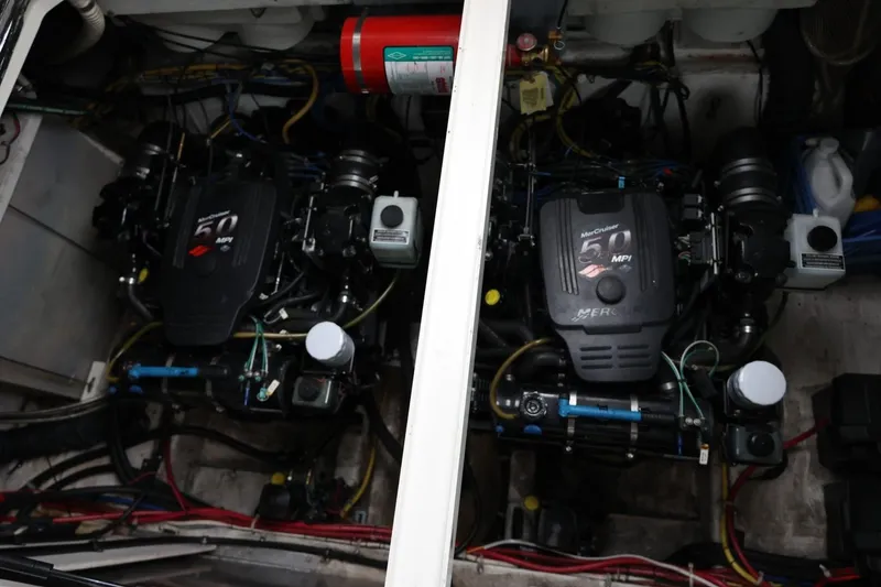 Slide: The Image of Engine compartment of a 2005 Maxum 3300 SE boat with twin MerCruiser engines. - 45