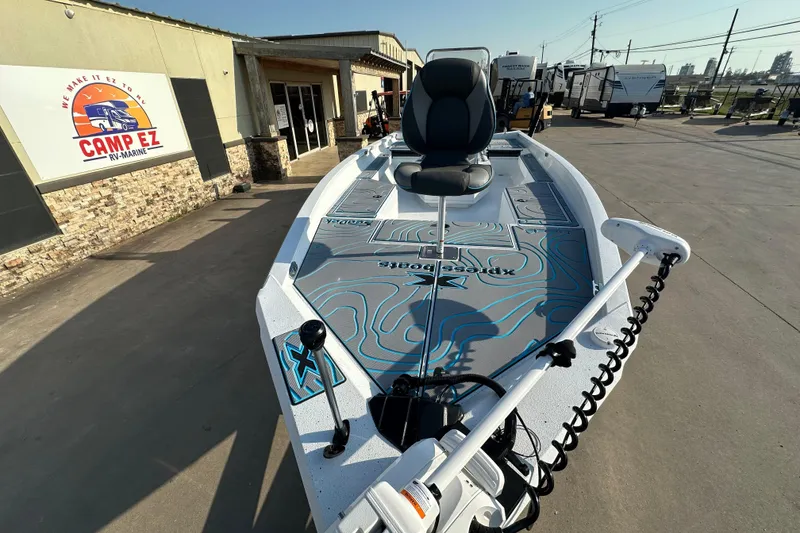 Slide: The Image of 2026 Express H22B boat at Camp EZ RV-Marine dealership, showcasing sleek design and advanced features. - 10