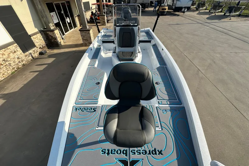 Slide: The Image of 2026 Express H22B boat with sleek design, comfortable seating, and modern features. - 13