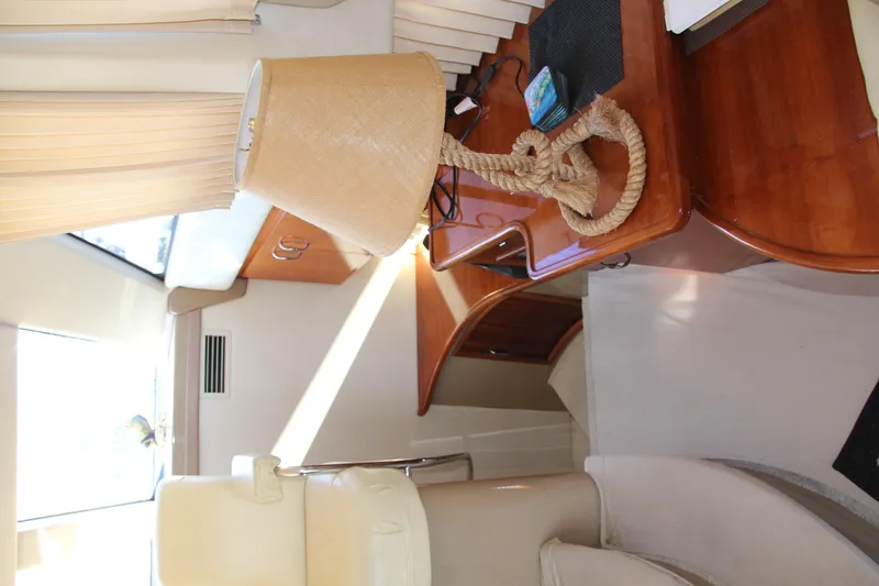 Slide: The Image of Interior of 2004 Carver 360 Sport Sedan with elegant furnishings and natural light. - 13