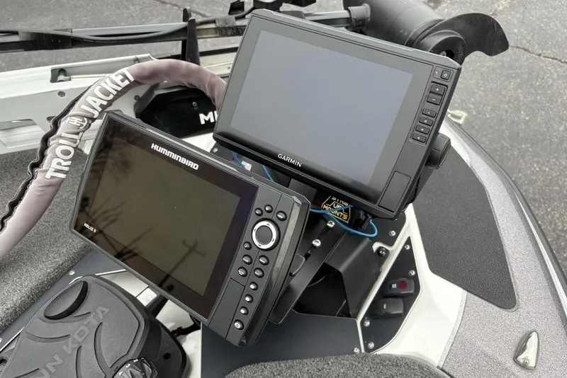 Slide: The Image of 2021 Skeeter ZXR20 boat with Garmin and Humminbird fish finders on the dashboard. - 10