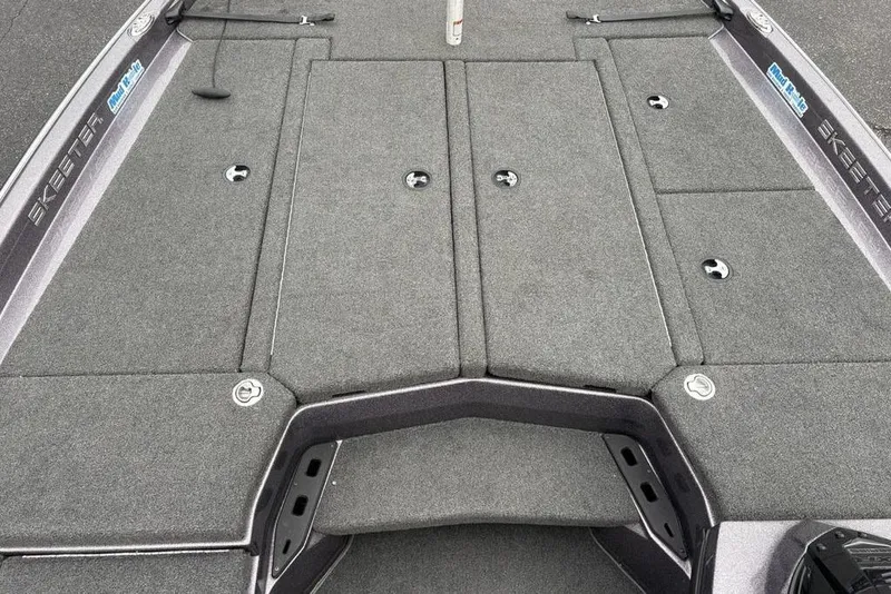 Slide: The Image of 2021 Skeeter ZXR20 boat deck with storage compartments and sleek design. - 15