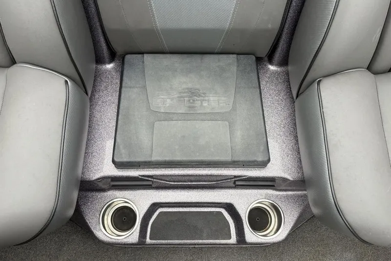 Slide: The Image of 2021 Skeeter ZXR20 boat interior with gray seating and dual cup holders. - 28