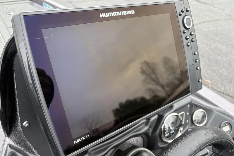 Slide: The Image of Humminbird Helix 12 fishfinder on 2021 Skeeter ZXR20 boat dashboard. - 29
