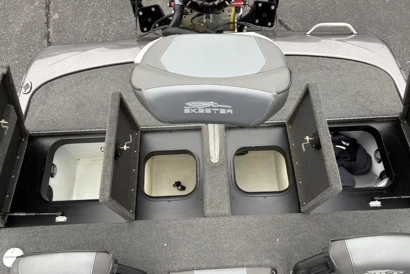 Slide: The Image of 2021 Skeeter ZXR20 boat storage compartments and seating area. - 33