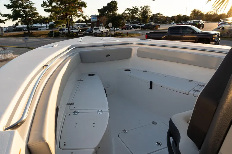 Slide: The Image of 2026 Sea Pro 262 Offshore boat interior with seating and storage compartments. - 13