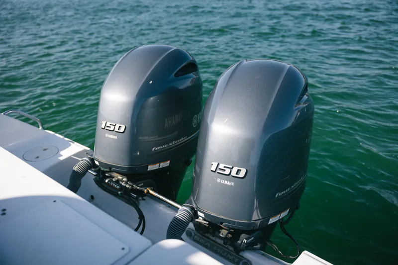 Slide: The Image of Twin Yamaha 150 outboard motors on a 2019 Sea Hunt Gamefish 27 Coffin Box boat. - 20