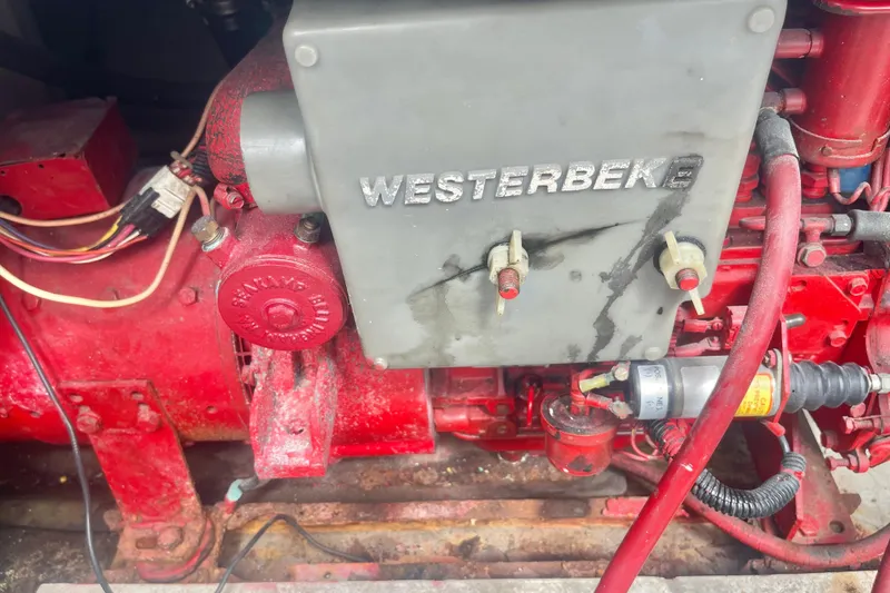 Slide: The Image of Engine compartment of 1983 Bayliner 3888 MY Sedan with Westerbeke generator. - 27
