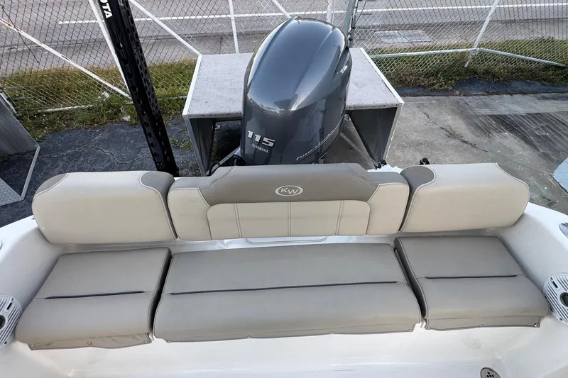 Slide: The Image of 2023 Key West 189 FS boat with Yamaha 115 engine, featuring comfortable seating. - 19