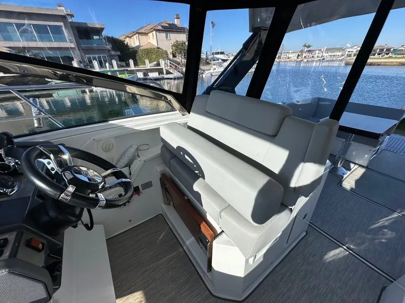 Slide: The Image of Captains chair with flip up bolster - 13