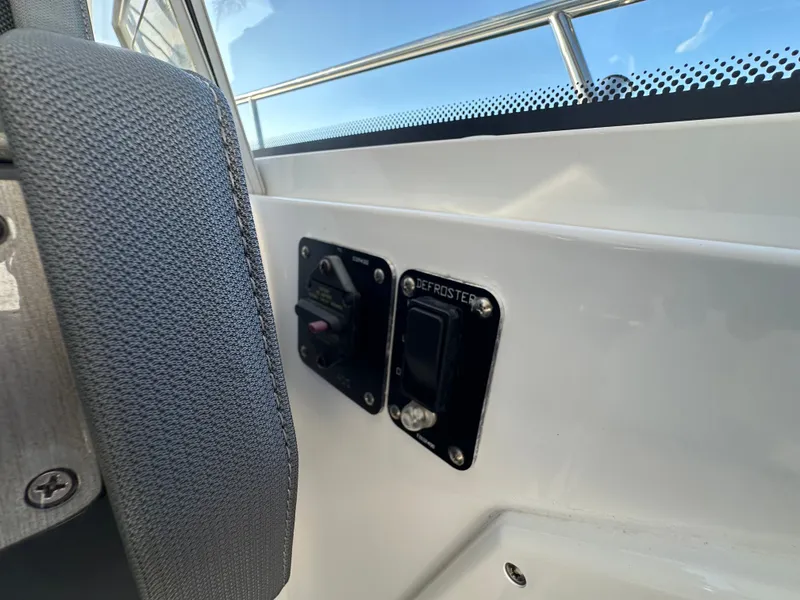 Slide: The Image of window defogger and windlass circuit breaker switches - 43