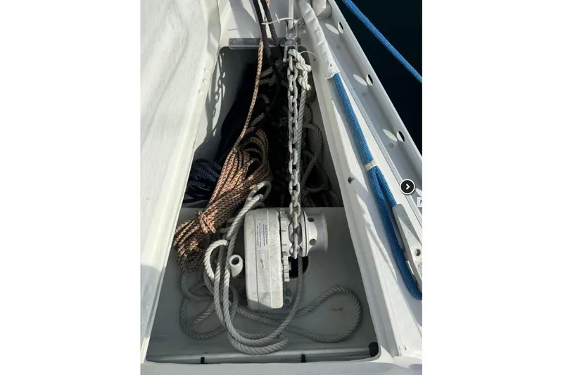 Slide: The Image of Cozy cabin interior of 1992 Beneteau Oceanis 350 sailboat with wooden furnishings. - 16