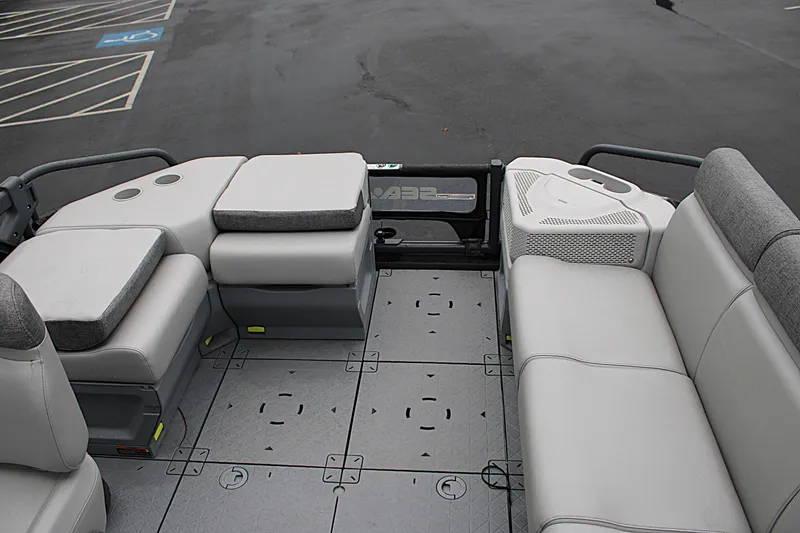 Slide: The Image of 2023 Sea-Doo Switch Cruise 21 interior with gray seating and spacious layout. - 14