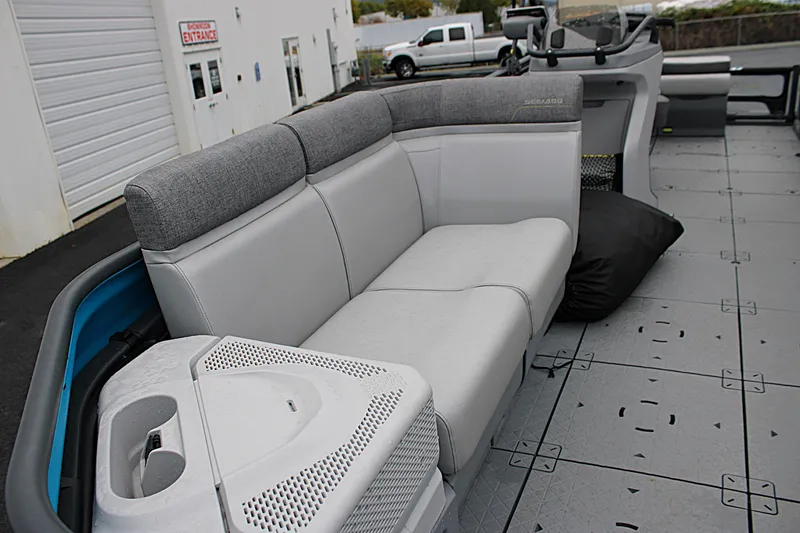 Slide: The Image of 2023 Sea-Doo Switch Cruise 21 interior with gray seating and modern design. - 16