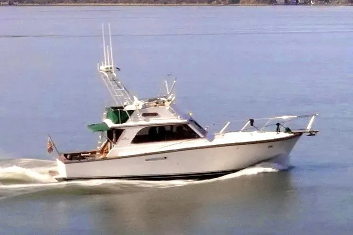 The Image of 1983 Egg Harbor 40 Sedan cruising on calm waters. - 0