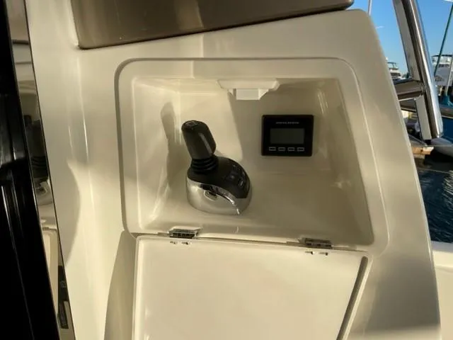 Slide: The Image of Control panel of a 2017 Prestige 500 yacht with joystick and display. - 13
