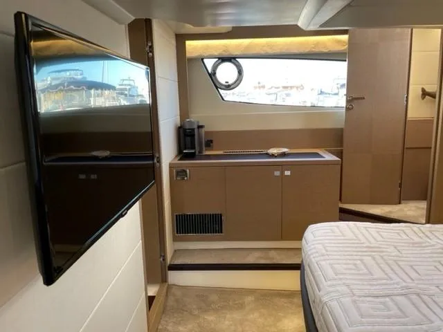 Slide: The Image of Luxurious interior of a 2017 Prestige 500 yacht with modern amenities and elegant design. - 43