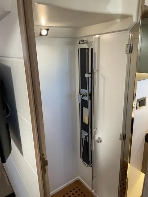 Slide: The Image of Compact shower cabin in 2017 Prestige 500 yacht, featuring modern fixtures and sleek design. - 45