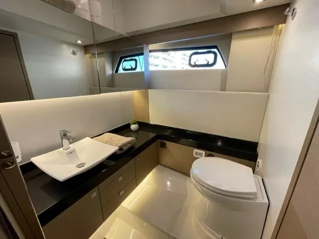 Slide: The Image of Luxurious bathroom in 2017 Prestige 500 yacht with modern fixtures and elegant design. - 46
