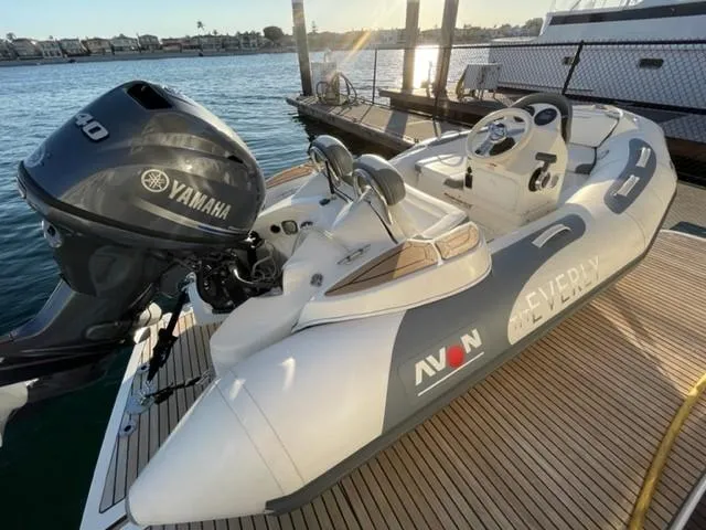 Slide: The Image of Inflatable boat with Yamaha motor docked on wooden platform, Prestige 500, 2017 model. - 7