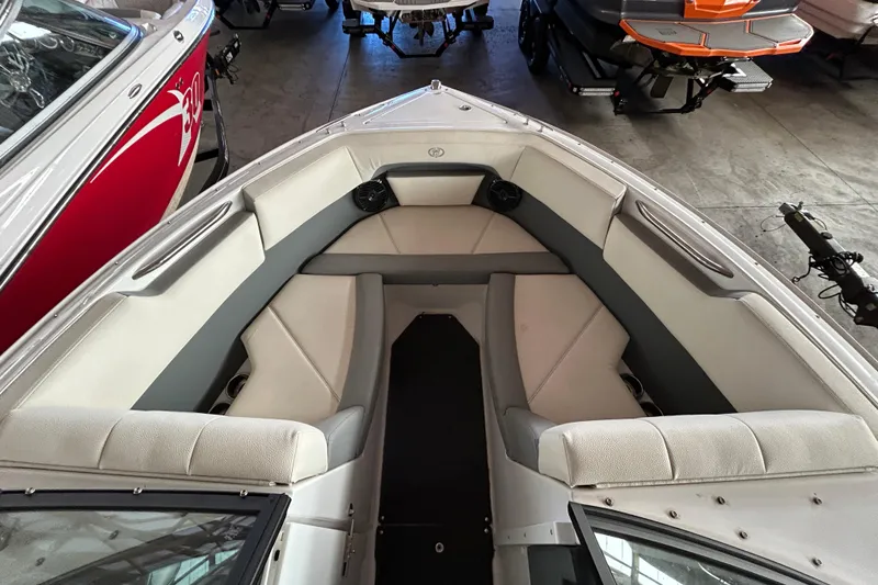 Slide: The Image of 2021 Cobalt CS22 boat interior with spacious seating and modern design. - 12