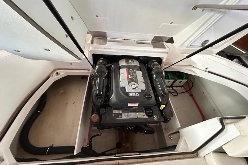 Slide: The Image of 2021 Cobalt CS22 boat engine compartment with a 250 horsepower engine. - 17