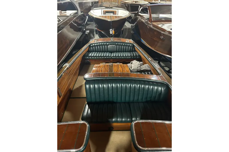 Slide: The Image of 2010 StanCraft 27 Lowboy boat with luxurious wood and leather interior. - 12
