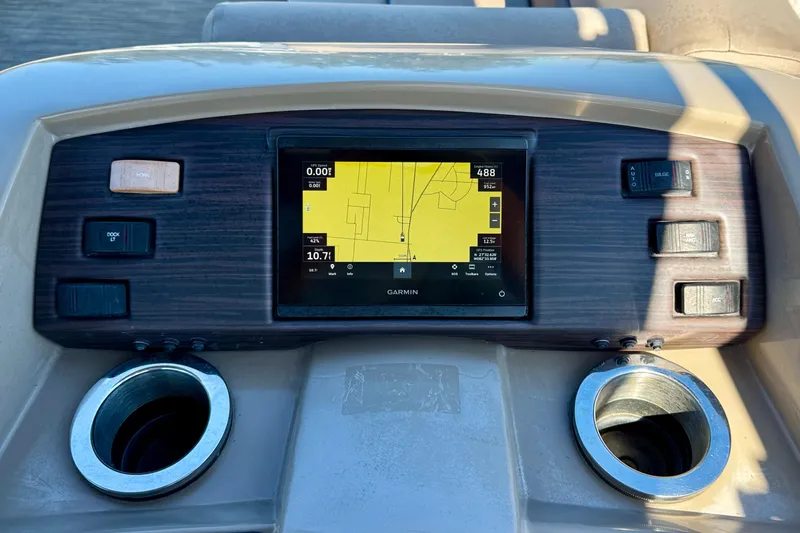 Slide: The Image of Dashboard of 2023 Bennington 23 SX boat with Garmin navigation display. - 15