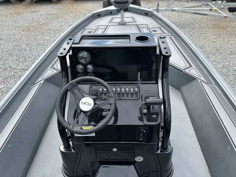 Slide: The Image of Interior view of 2026 Excel 230 Bay Pro boat. - 5